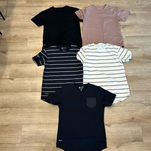 Five (5) BYLT Curved hem T shirts.